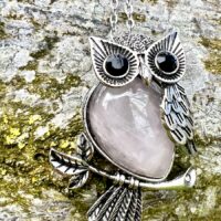 Owl Pendant Set with A Gemstone Body Of Rose Quartz Inset with Faceted Eyes