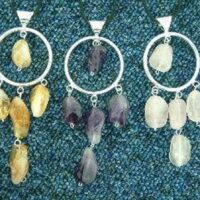 Silver Plated Round Wire Pendant Featuring Drilled Polished Pebbles. 100mm Drop