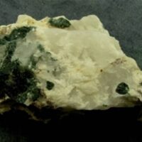 Blue Tourmaline Crystals in Micaceous Quartz Matrix